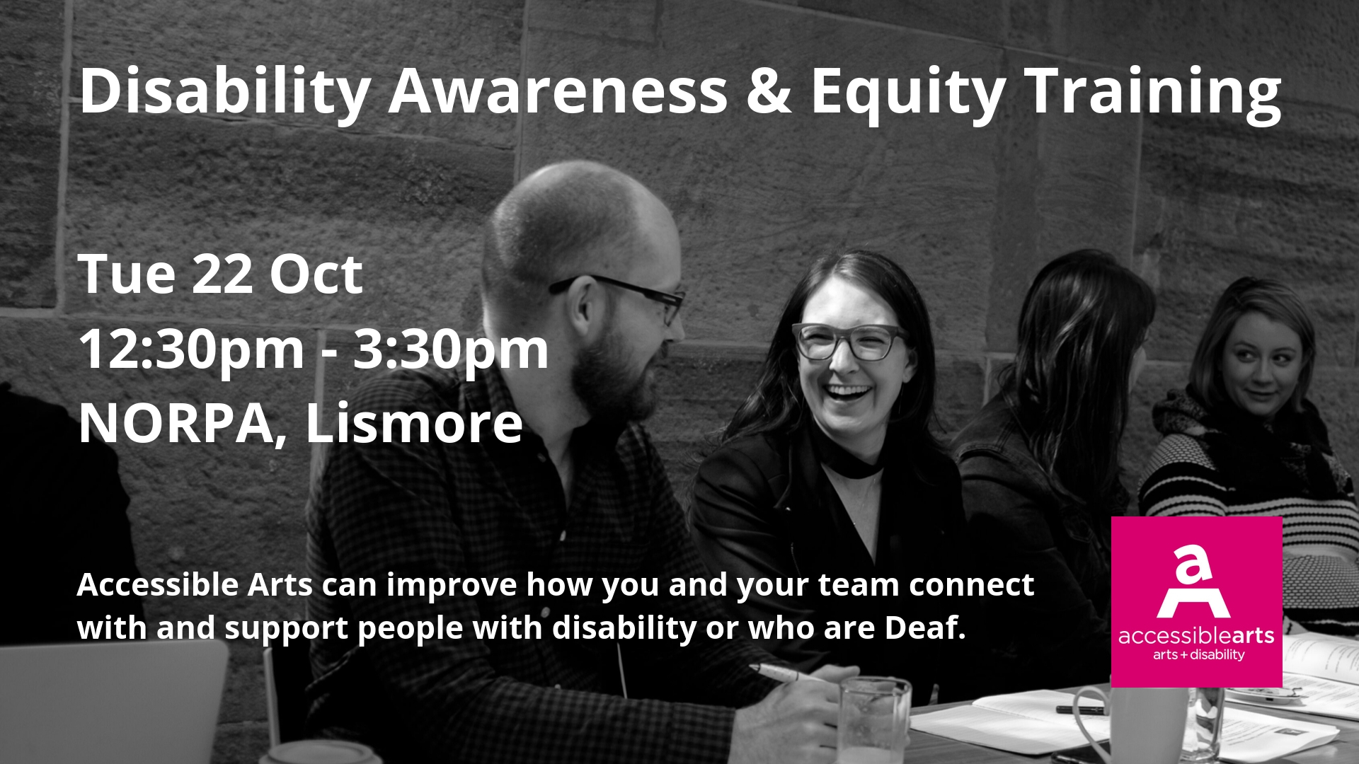 Image shows four people sitting at a long table, with one woman smiling and laughing. The words 'Disability Awareness & Equity Training' are across the top.